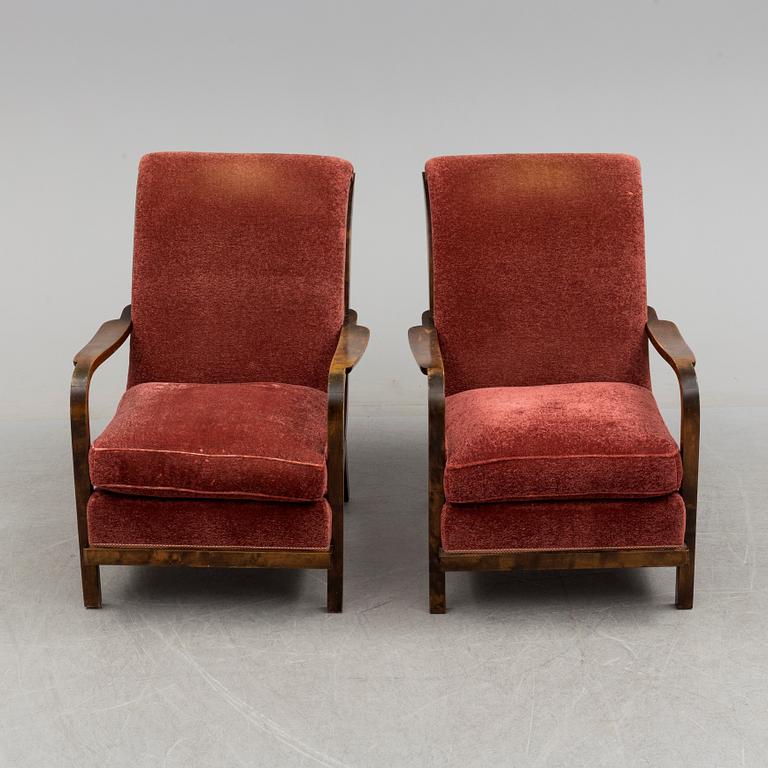 WILHELM KNOLL, a pair of stained birch easy chairs, 1930's/40's.