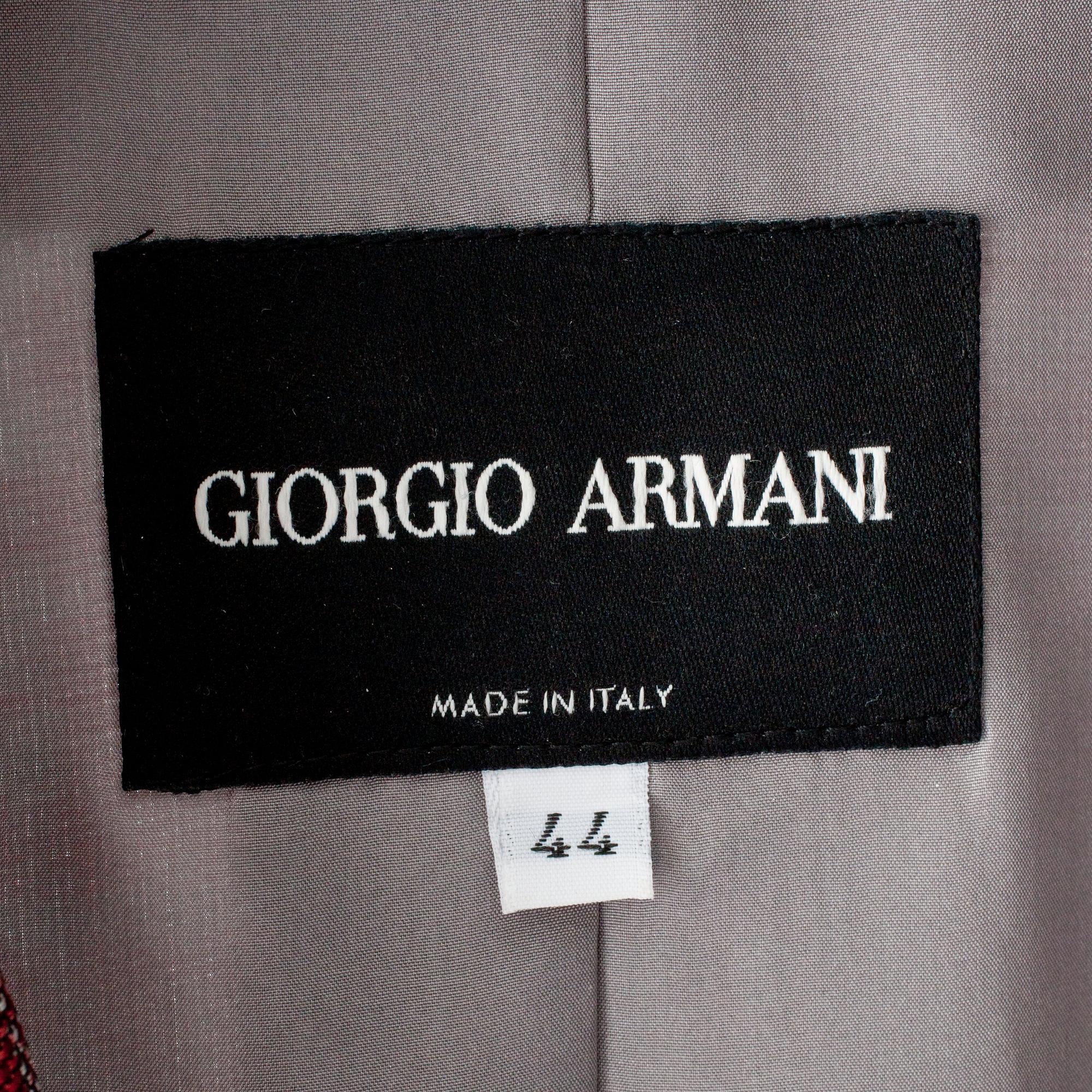 GIORGIO ARMANI, tredelad dräkt bestående av kavaj, byxa  samt linne.