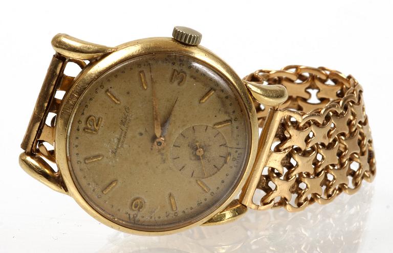 ARMBANDSUR, 18 K guld, EHW, Stockholm, 1947. Tot vikt 68 gr.