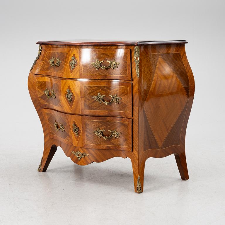 A Rococo style chest of drawers, mid-20th century.
