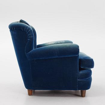 Josef Frank, a model 336 lounge chair for Firma Svenskt Tenn.