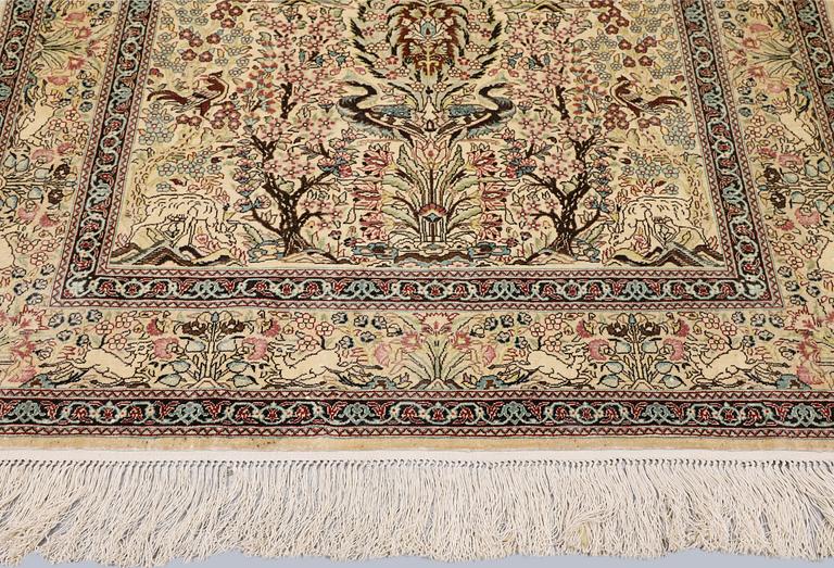 A Oriental silk carpet, 152 x 94 cm.