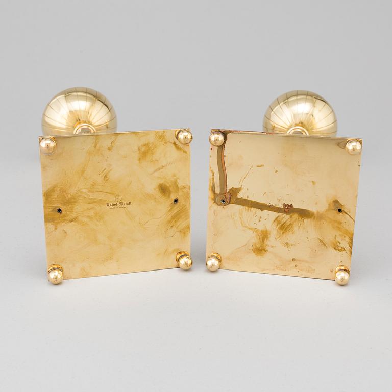 A pair of mid 20th century brass candlesticks by Gunnar Ander for Ystad Metall.