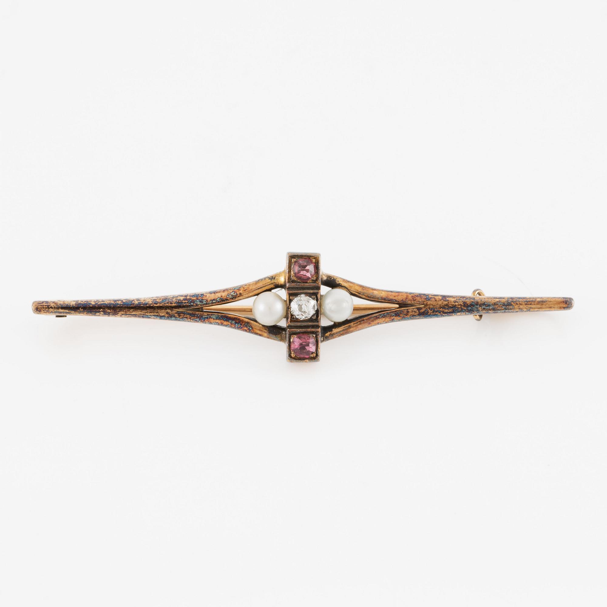 Brooch, 14K gold with a small old-cut diamond, pearls, and red stones.