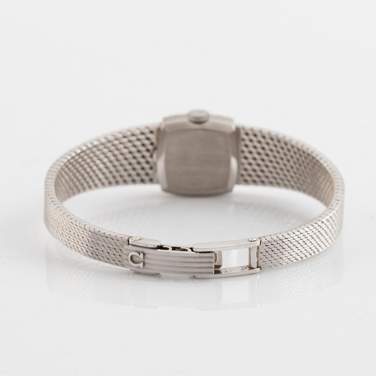 Omega, damarmbandsur, vitguld med åttkantslipade diamanter.