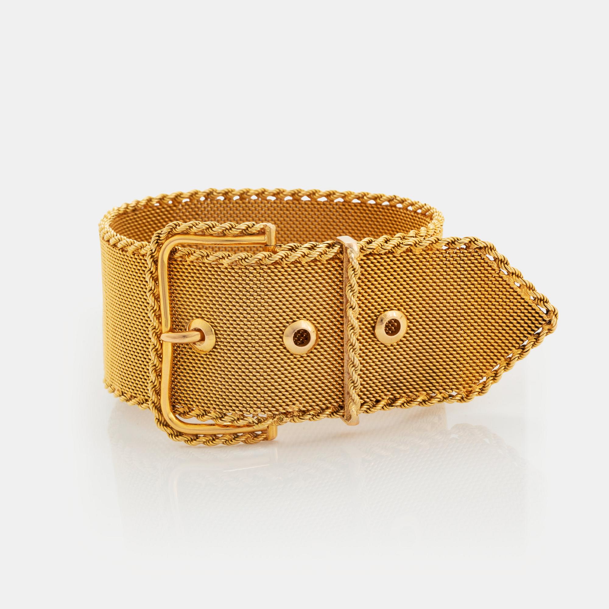 Armband 18K guld i form av ett bälte.