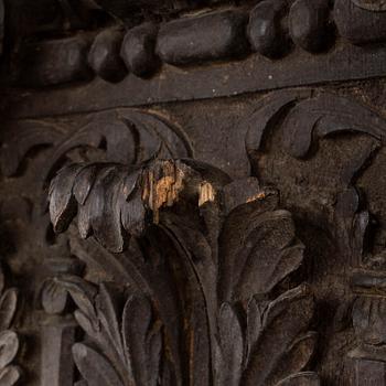 An 18th/19th century carved wood corinthian capital.