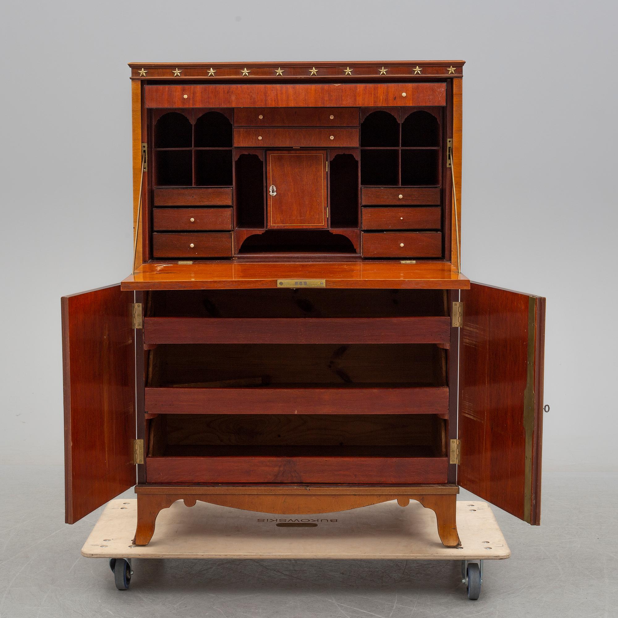 A northern european empire chiffonier, first half of the 19th century.