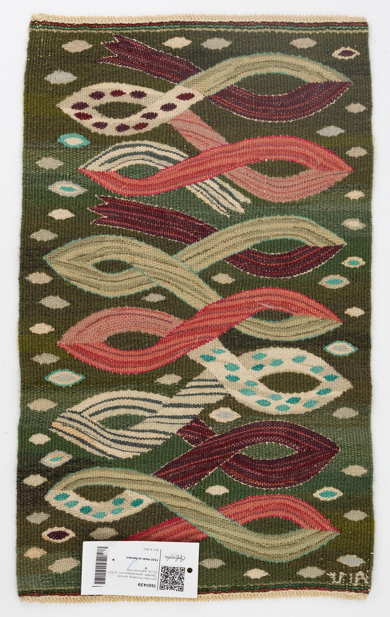 Ann-Mari Forsberg, a textile. "Bandet", a tapestry variant ca, ca 55 x 32 cm, signerad AMF.