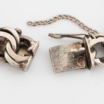 Silver bracelet.