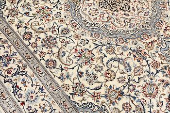 A Nain carpet, part silk, so-called 6LAA, c. 298 x 195 cm.