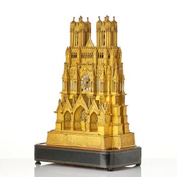 A Charles X ormolu mantel clock modelled as the Cathedral of Reims, Paris, 1820's.