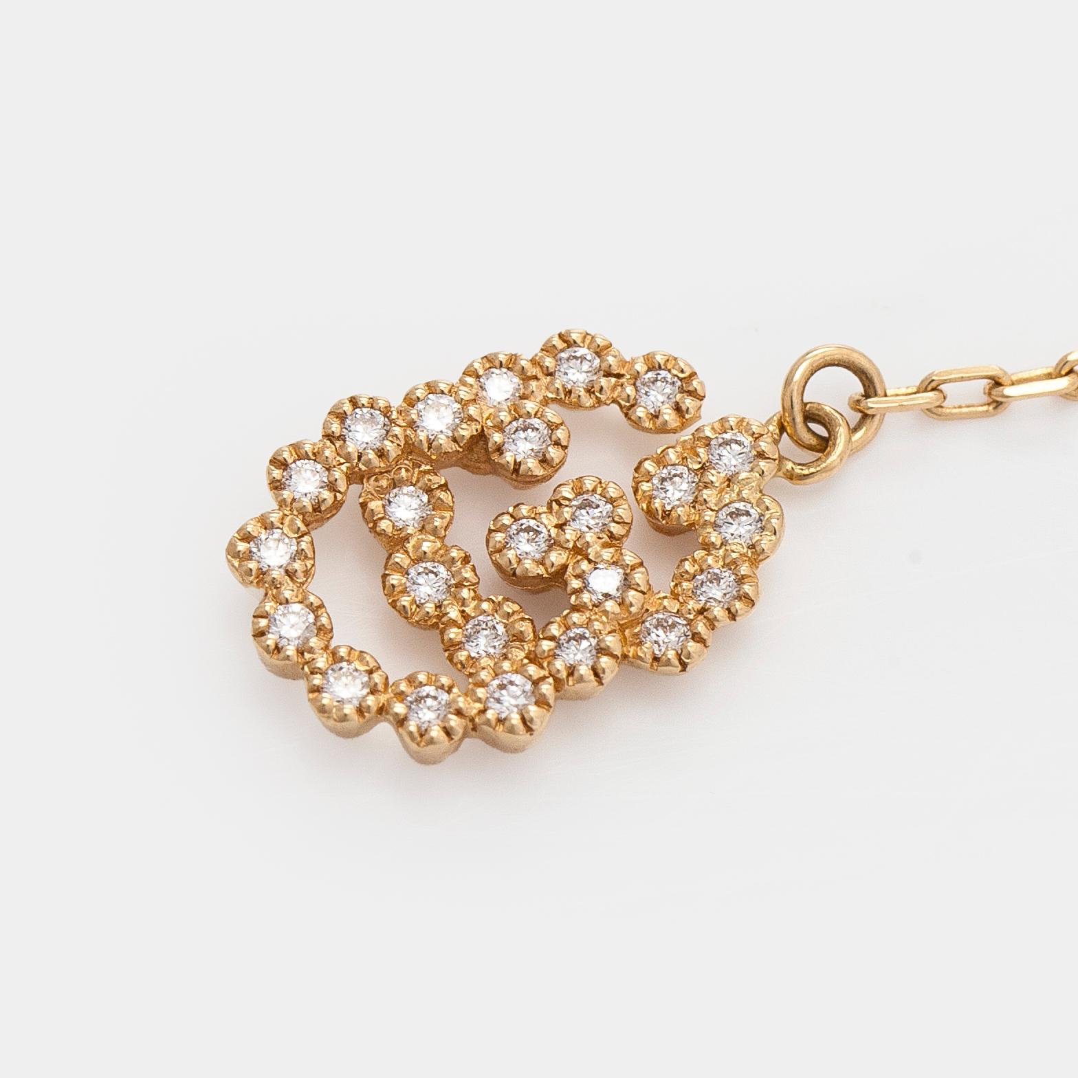 Gucci, armband, "Interlocking", 18K guld med briljantslipade diamanter.