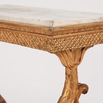 A matched pair of Swedish Empire console tables, first half of the 19th century.