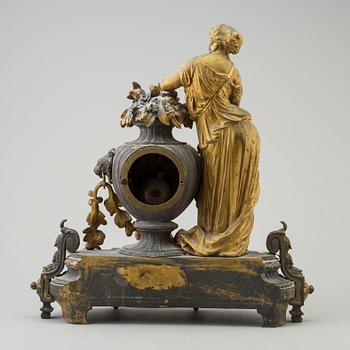 An end of the 20th century metal case mantle clock.