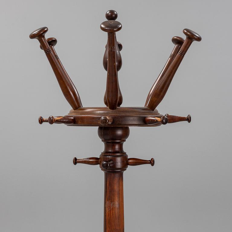 A stained pine clothes hanger, first half of the 20th century.