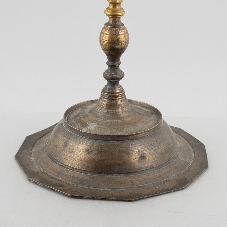 A Baroque-style floor candle stick, around 1900.