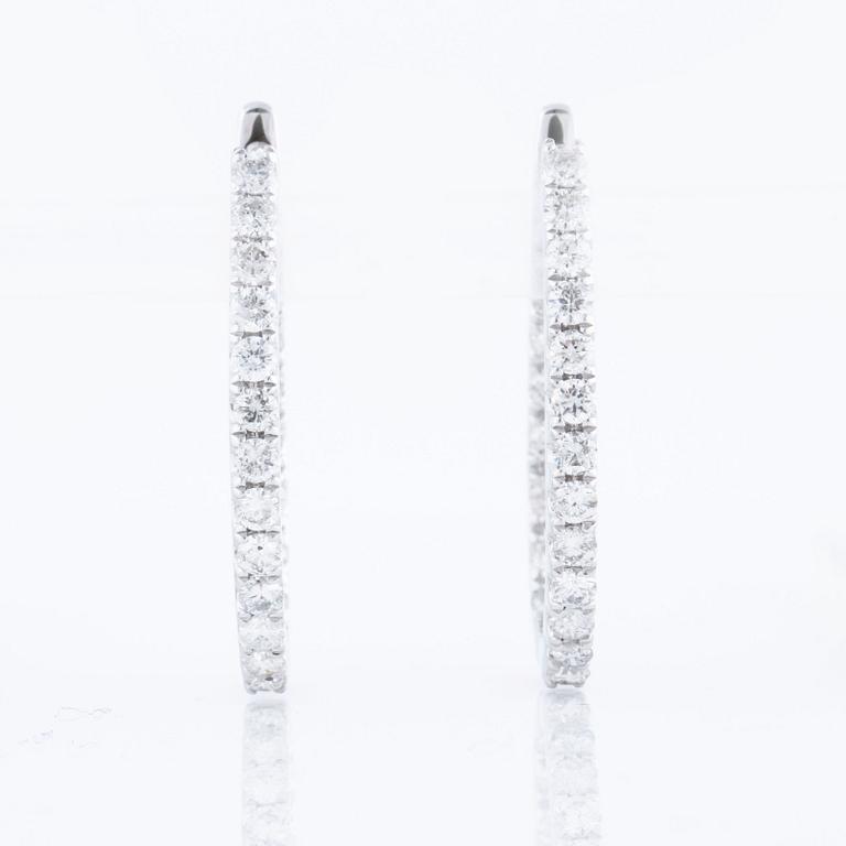 A pair of ca 1.90 cts brilliant cut diamond earrings.