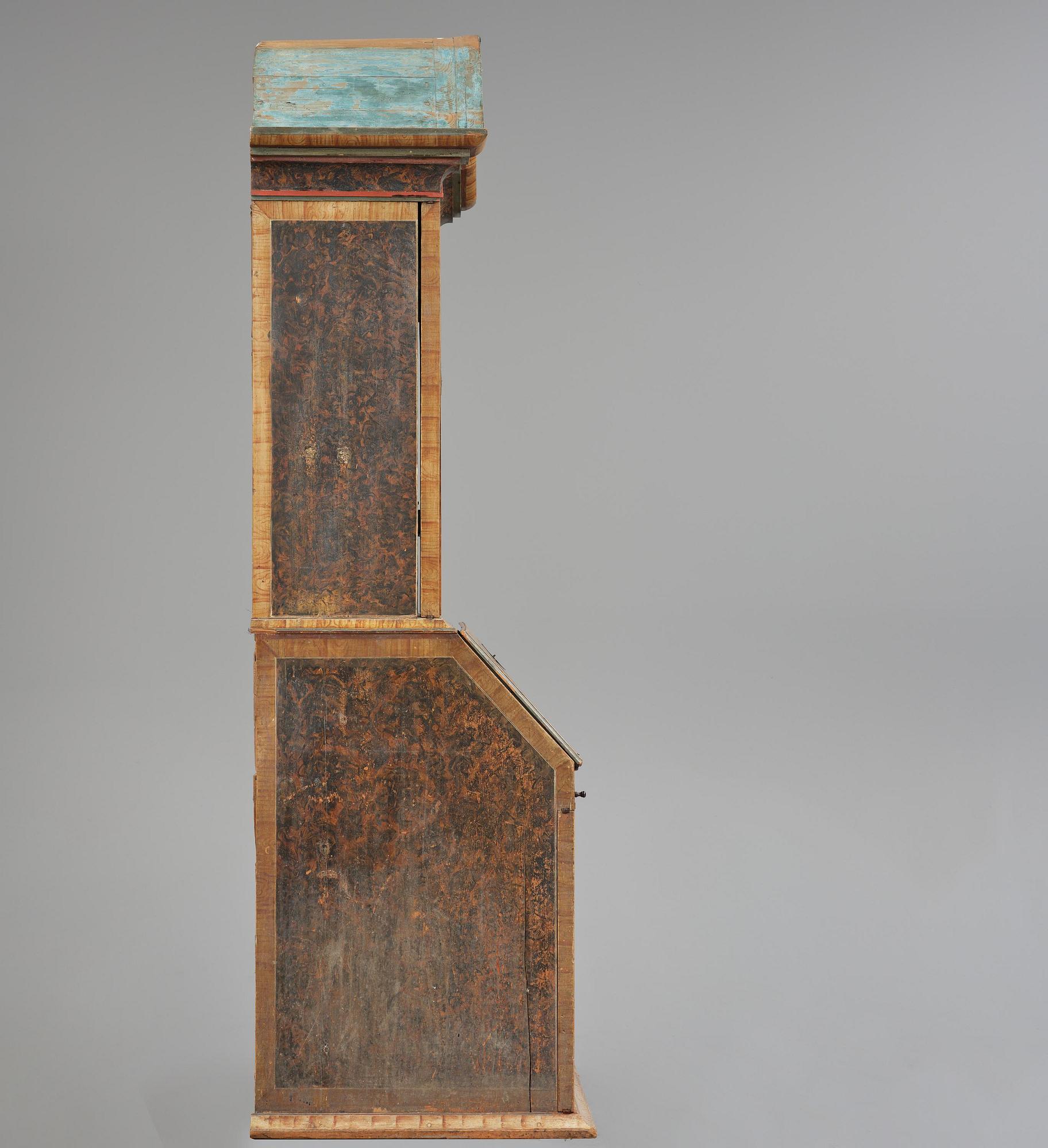 A polychrome-painted folk art cabinet from Värmland, Sweden, dated 1818.
