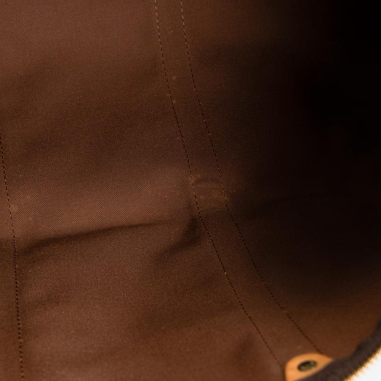 Louis Vuitton, a Monogram Canvas 'Keepall 55 bandoulière' bag.