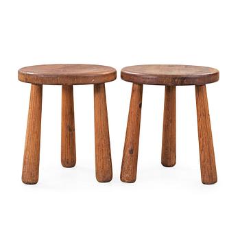 495. Axel Einar Hjorth, A pair of 'Utö' stained pine stools, Nordiska Kompaniet, NK, Sweden 1930's.