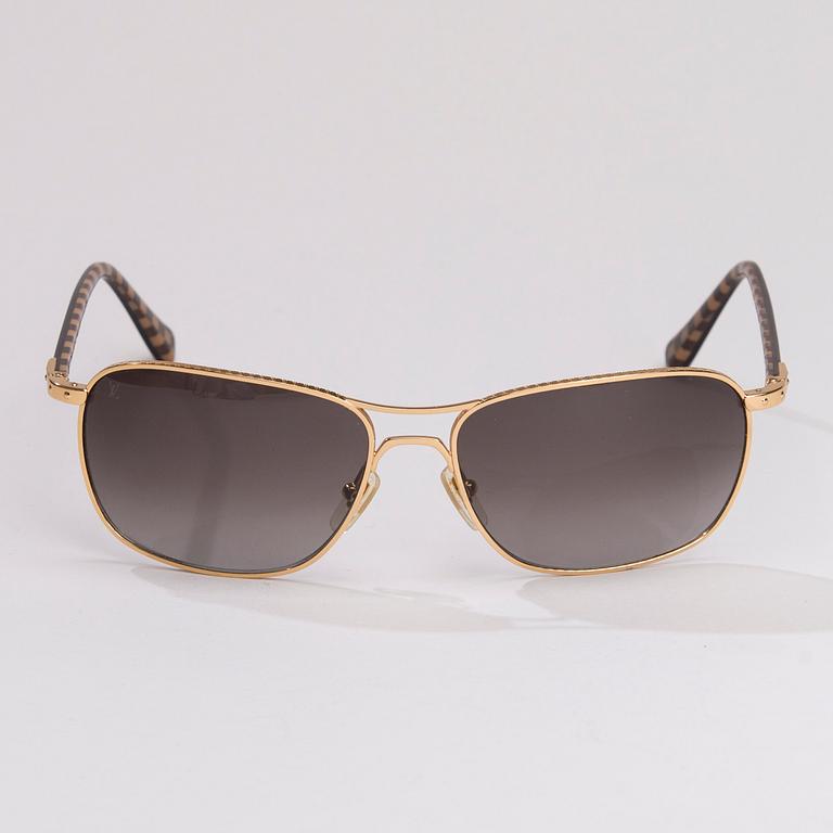 SOLGLASÖGON, Louis Vuitton.