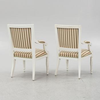 A pair of Gustavian style armchairs, around 1900.