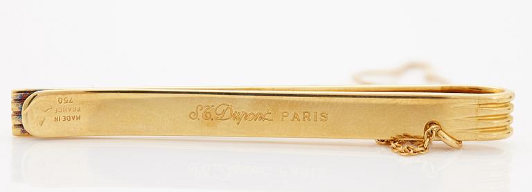 A 1960/70's tie-clip decorated with a carré-cut sapphire by Dupont, Paris.
