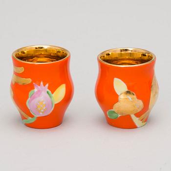 A 13-piece porcelain vodka set by Dulevo, USSR, second half of 20th Century.