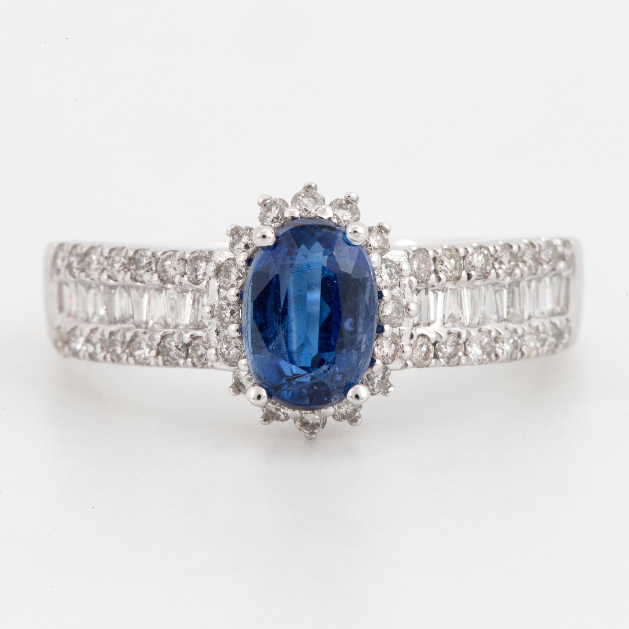Kyanite and brilliant-cut diamond ring.