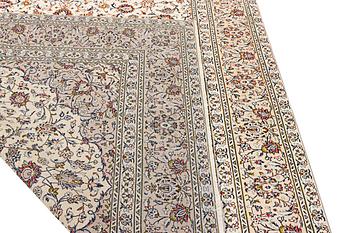 A Keshan carpet, c. 342 x 247 cm.
