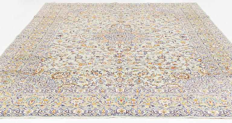 A Keshan carpet, signed, c. 410 x 297 cm.