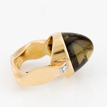 Ring, Hans Scherlund, 18K gold with cabochon-cut tourmaline and brilliant-cut diamonds.