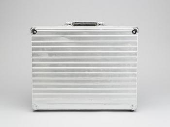 A set of three Rimowa bags later part of the 20th century.