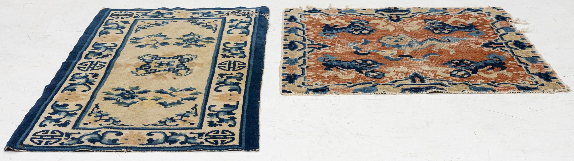 Two Chinese carpet fragments, late Qing dynasty.