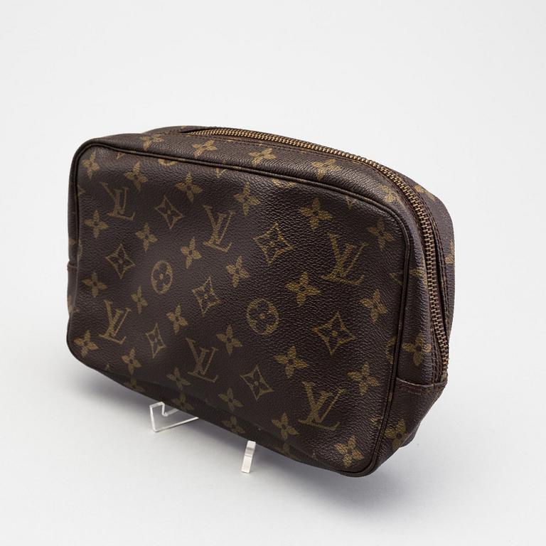 A Louis Vuitton toiletry bag.