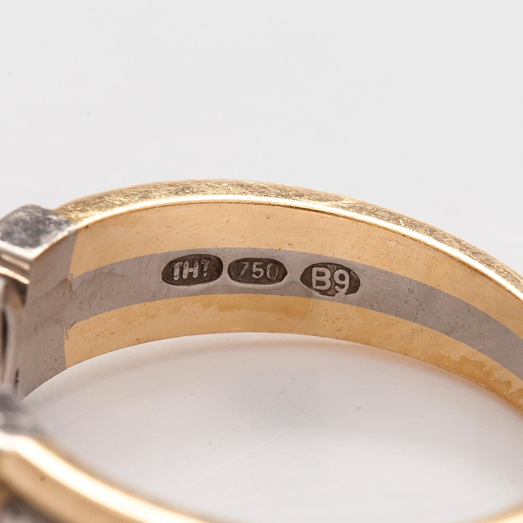 Ring, briljantslipad, orange-brun diamant ca 1,30 ct, 18K guld och vitguld.  H. Tuomaala, 2003.