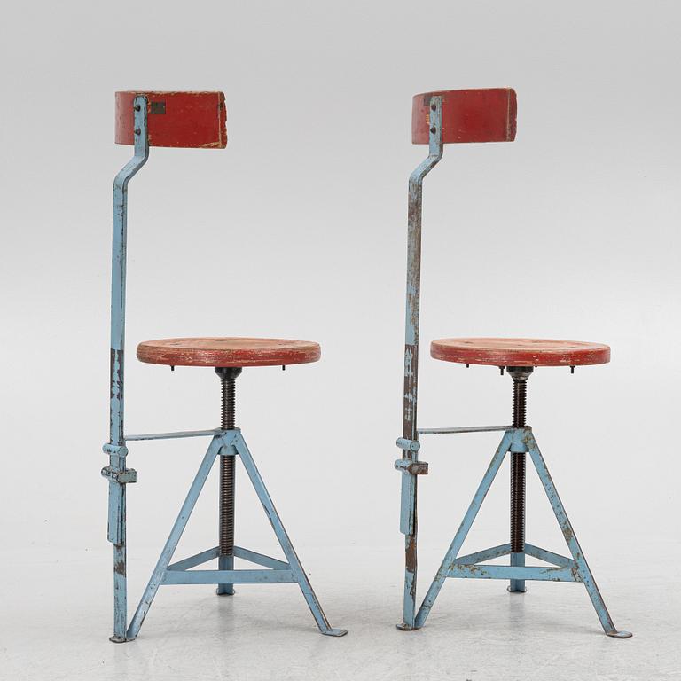 A pair of industry style chairs, Poland.