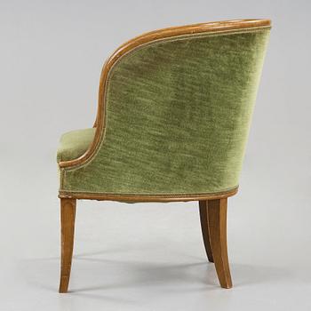 Axel Einar Hjorth, A 'Bellman' elm armchair, attributed to Axel Einar Hjorth, Nordiska Kompaniet, Sweden ca 1929.