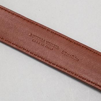 A Bottega Veneta leather belt.