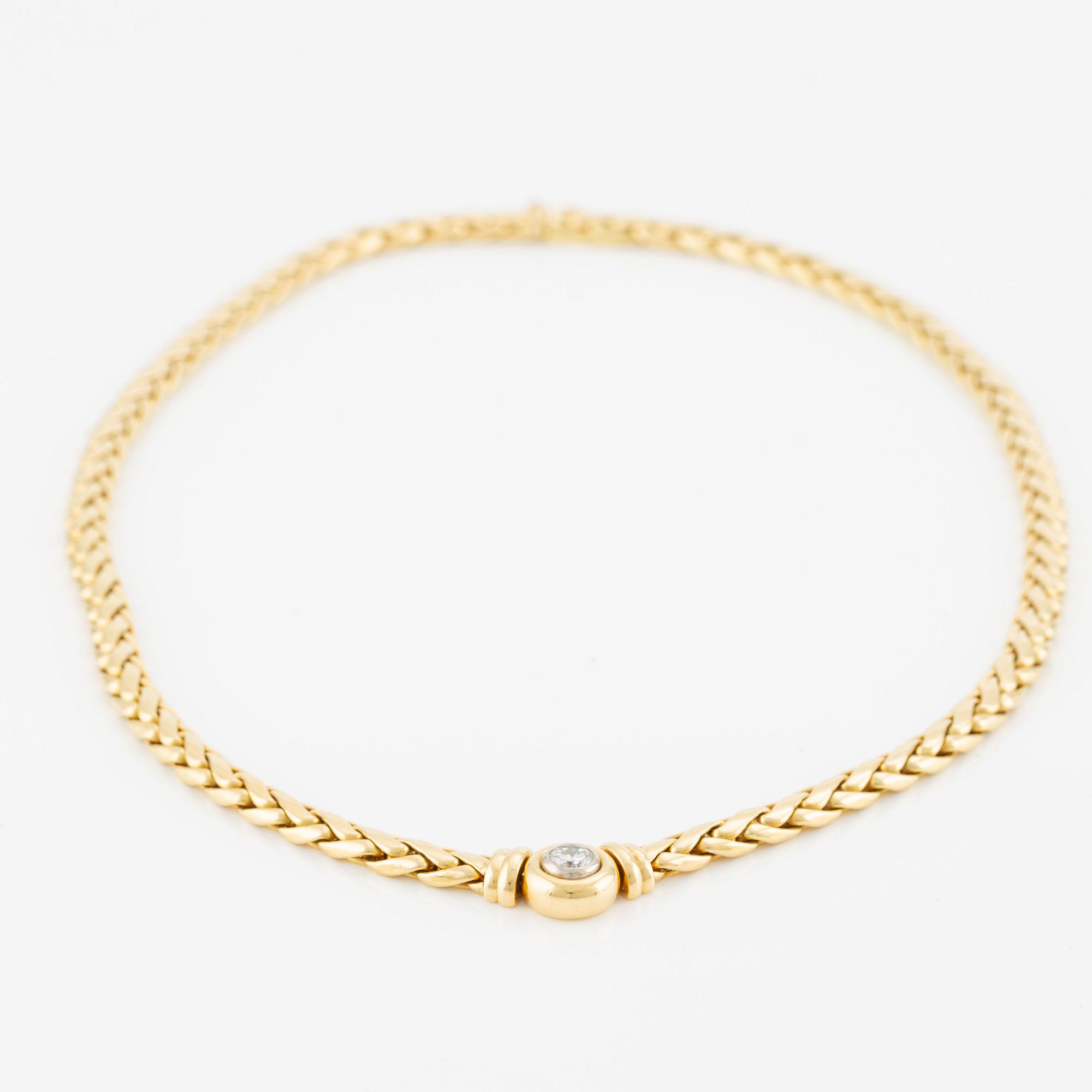 Collier/armband med en rund briljantslipad diamant ca 0.35 ct.