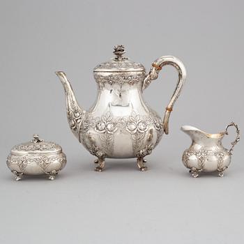 A silver coffee pot, creamer and sugar box. Swedish import mark.