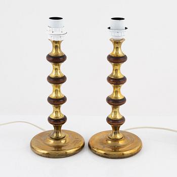 A pair of brass and wood table lights, Ivars Armatur, Sweden 1960-70s.