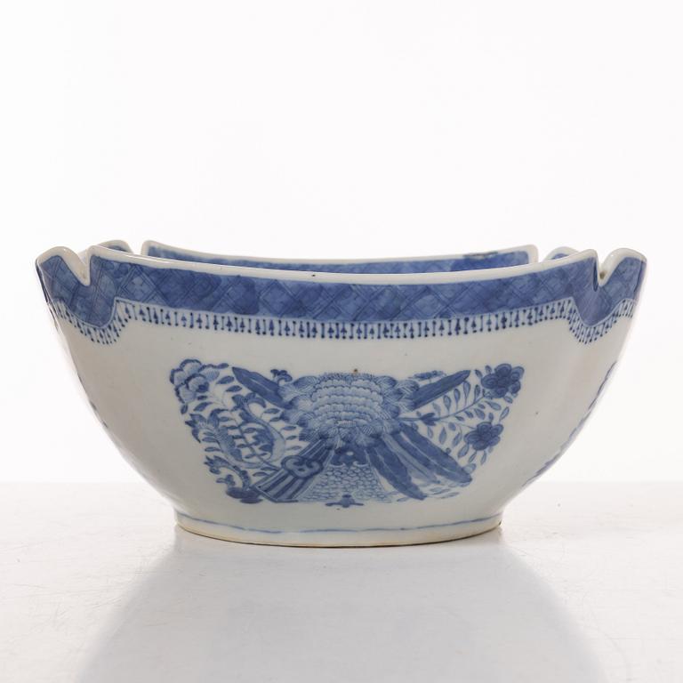 A group  of three serving dishes, a serving bowl, a cup, and seven plates, porcelain, including China 18th century.