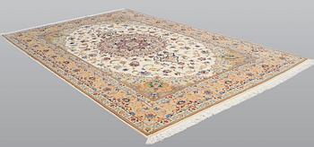 A carpet, Tabriz, ca 385 x 247 cm.