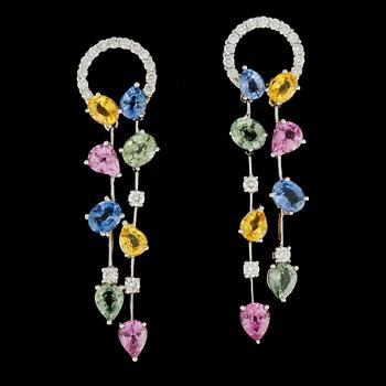 188. A pair of sapphire 6.22 cts and diamonds 0.55 ct earrings.