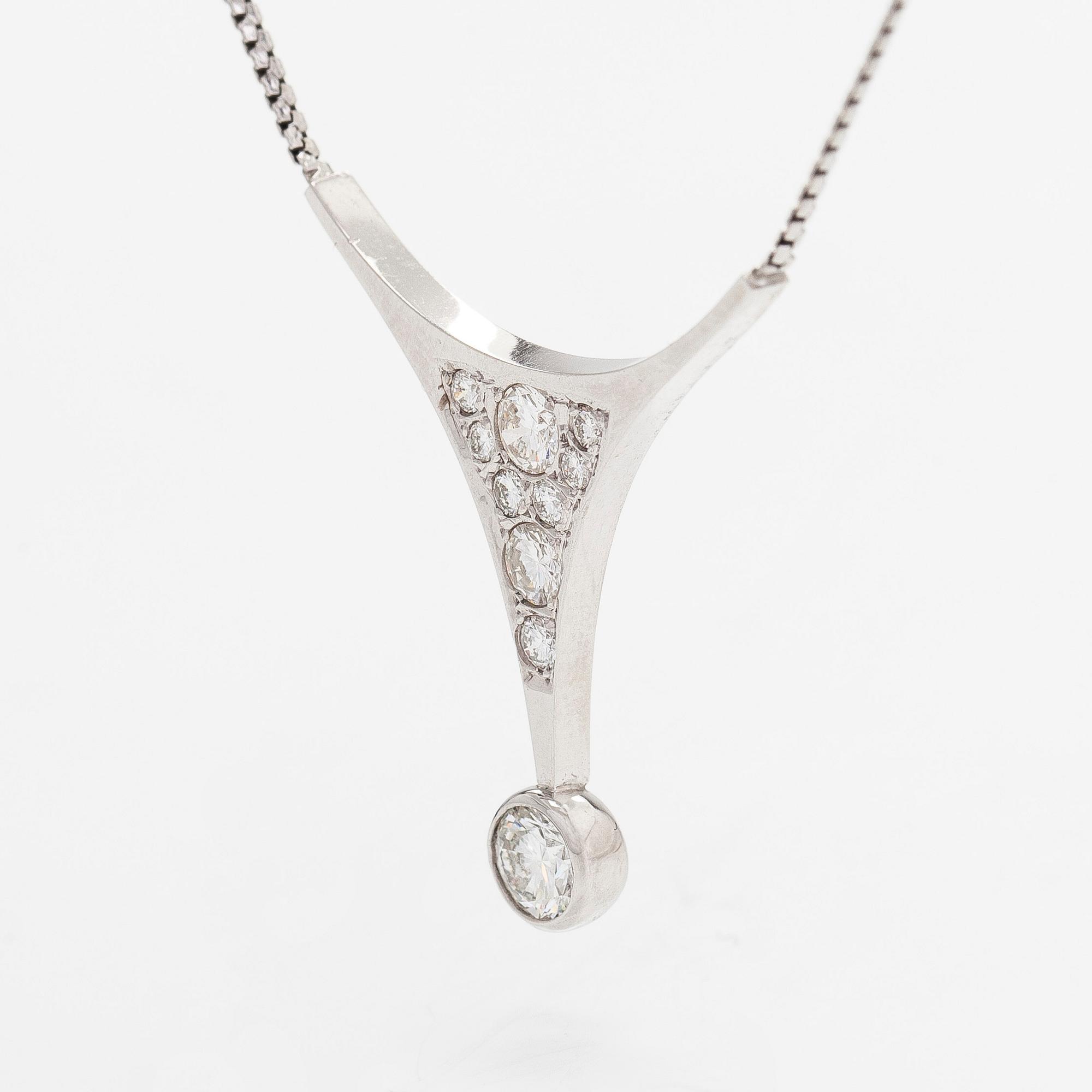 Kaulakoru, 14K valkokultaa, briljanttihiottuja timantteja yht. noin 1.37 ct. Suomalaiset tuontileimat 1988.