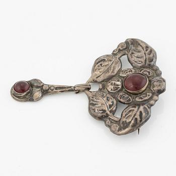 Brooch, Jugendstil, silver with red cabochon-cut stones.