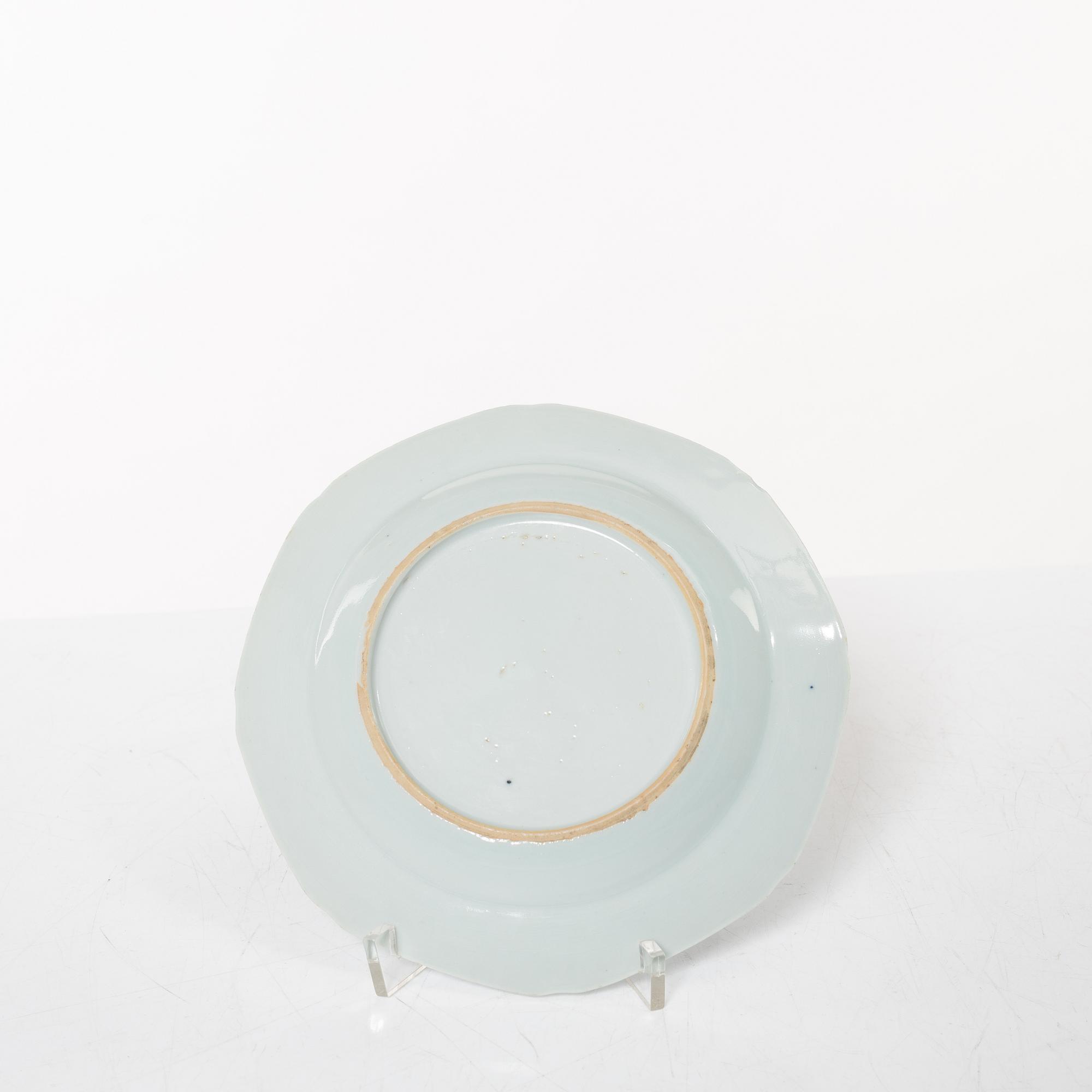 A group of 14 Chinese porcelain dessert dishes and a famile rose sauce boat, Qing dynasty, Qianlong (1736-95).