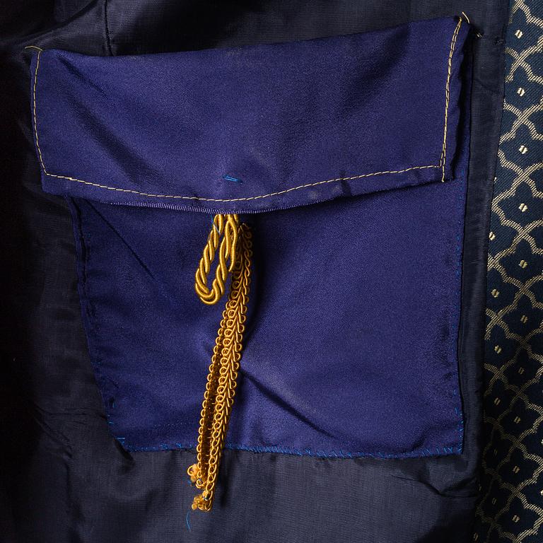 two theater coats from the late 20th century.